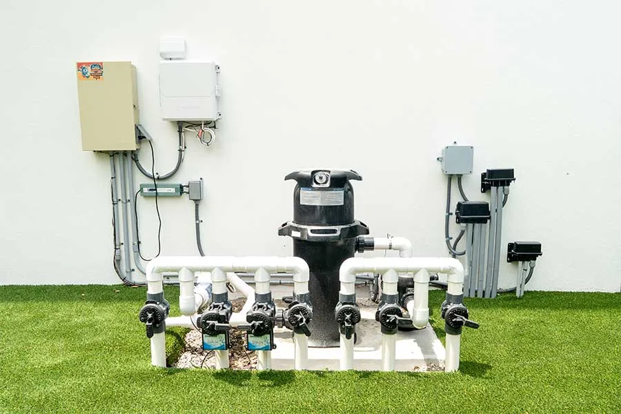 Pool equipment pad with pump, filter and heater