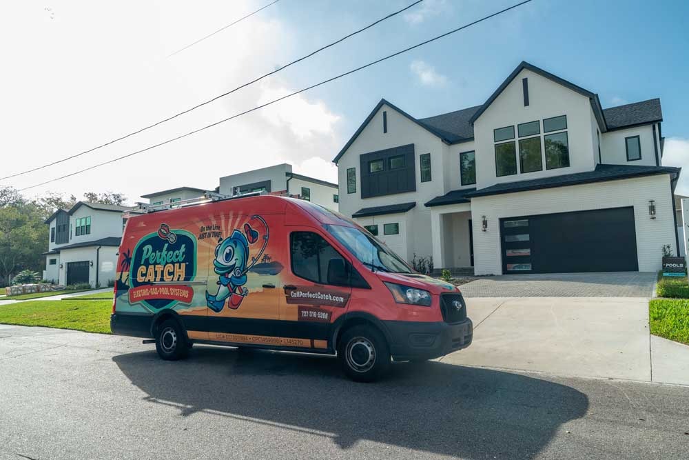 Perfect Catch service van outside a Pinellas home